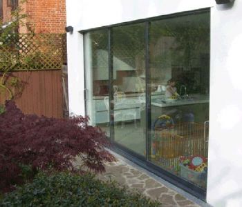 New Full Width Opening & Sliding Doors to Kitchen/Family Room